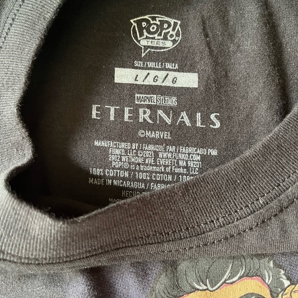 NWOT MARVEL ETERNALS Men’s Short Sleeve Black T W/ ETERNALS Cartoon On Front (L) - Picture 3 of 5